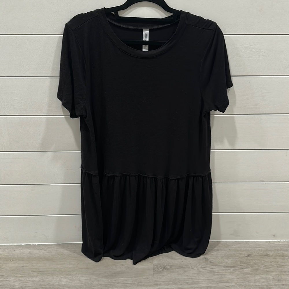 Black flowy ruffled bottom top.